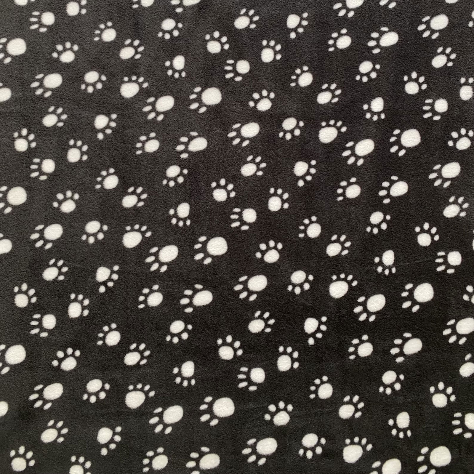 White Paws Fleece Fabric with Black
